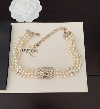 18K  Chanel Bag Pearls Chain Necklace